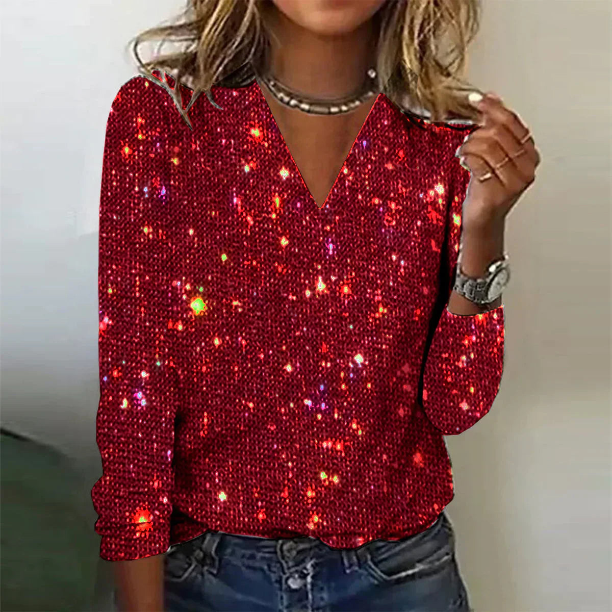 Emma – Elegant sparkling top with long sleeves and V-neck