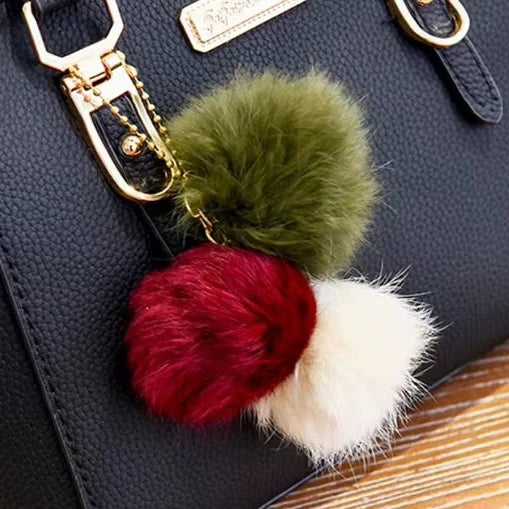 Stylish Leather Handbag with Pendant