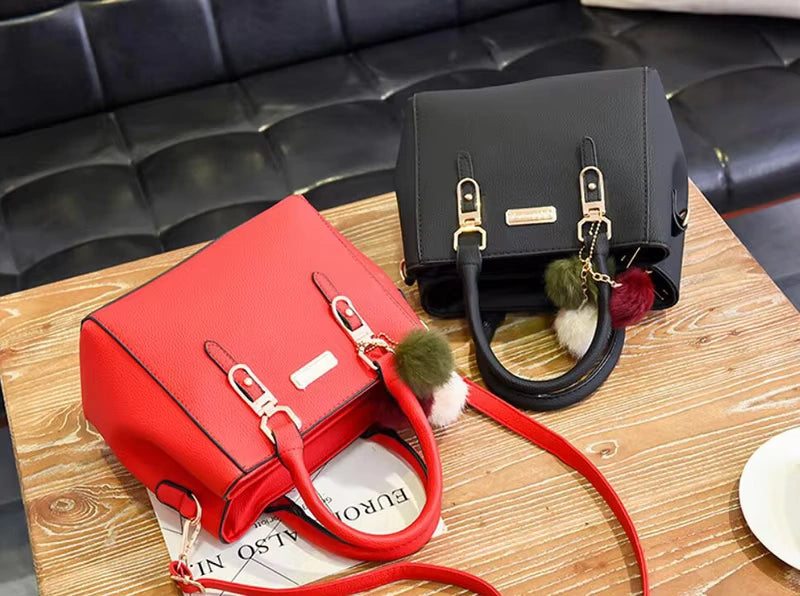 Stylish Leather Handbag with Pendant