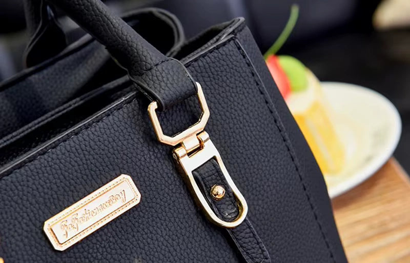 Stylish Leather Handbag with Pendant