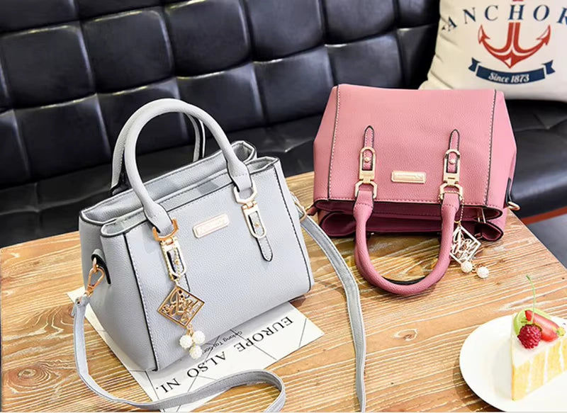 Stylish Leather Handbag with Pendant