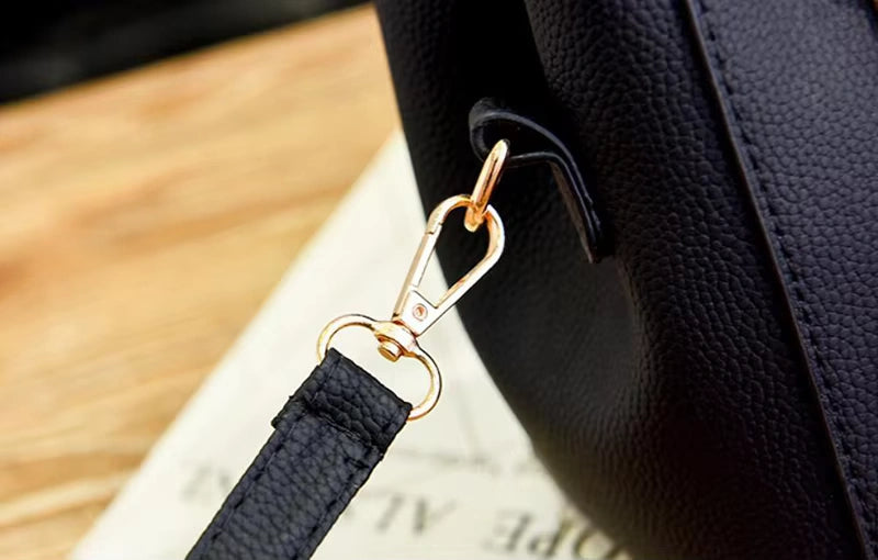 Stylish Leather Handbag with Pendant