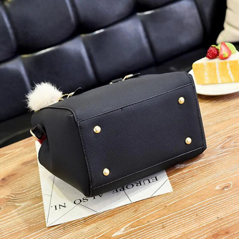 Stylish Leather Handbag with Pendant