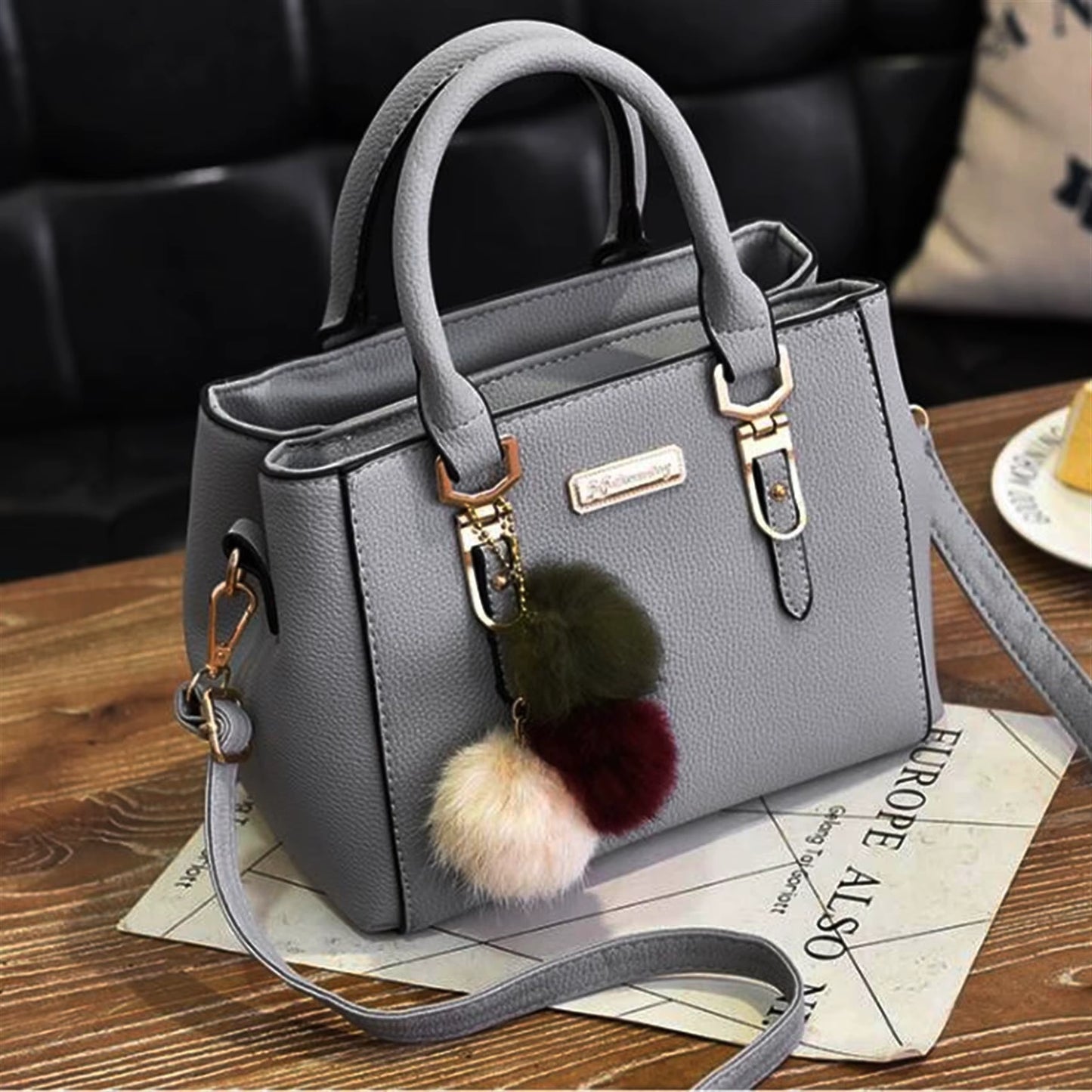 Stylish Leather Handbag with Pendant