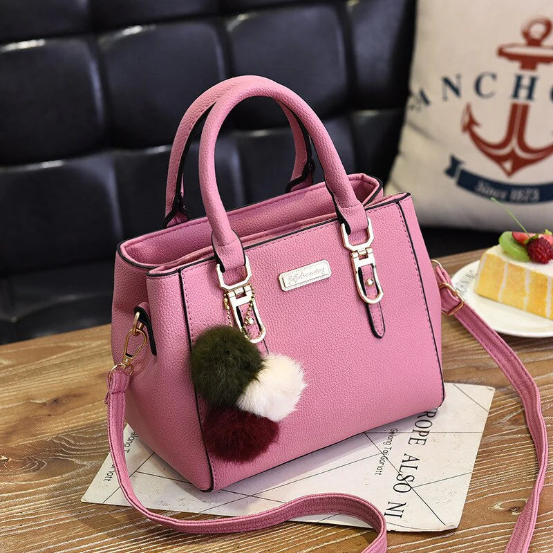 Stylish Leather Handbag with Pendant
