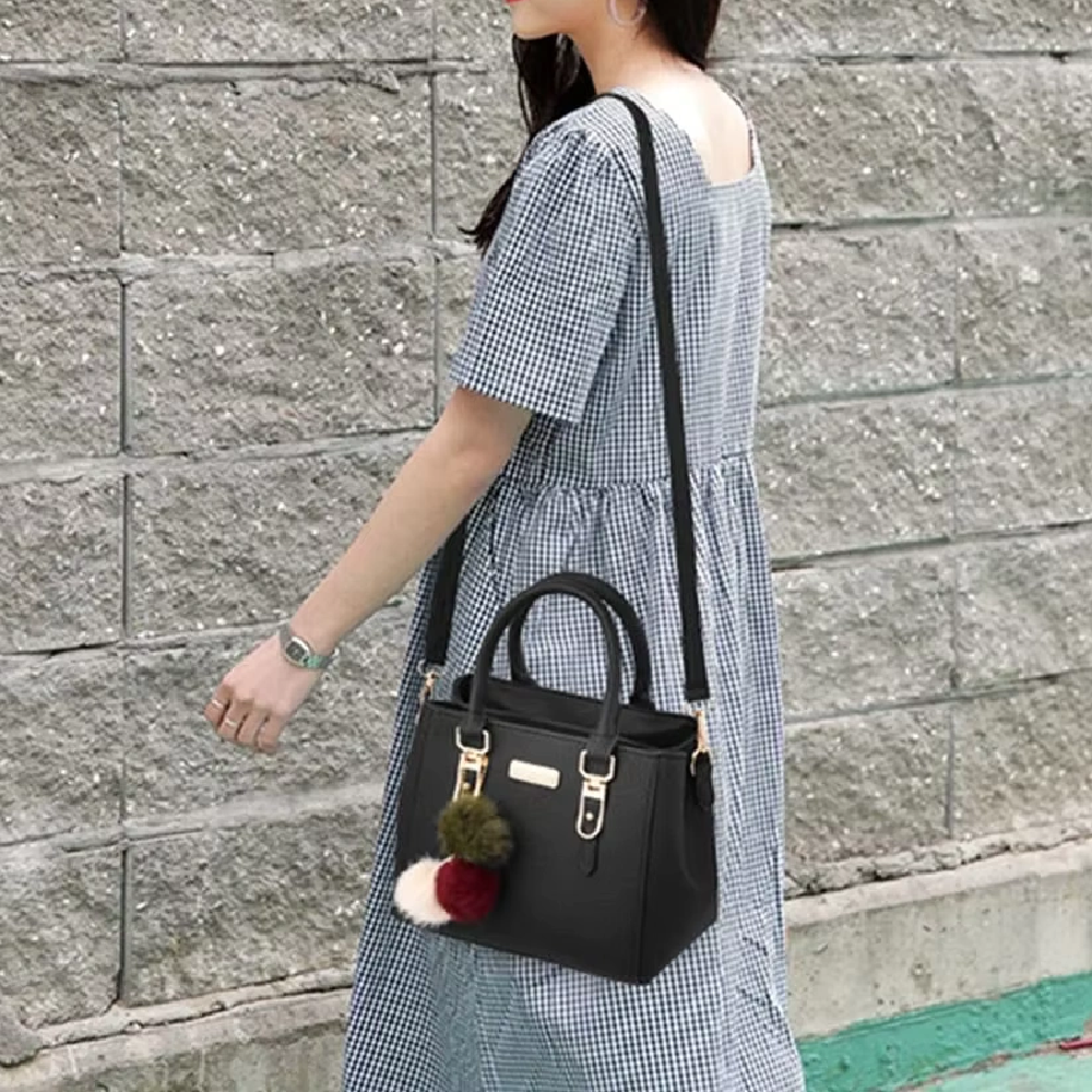 Stylish Leather Handbag with Pendant