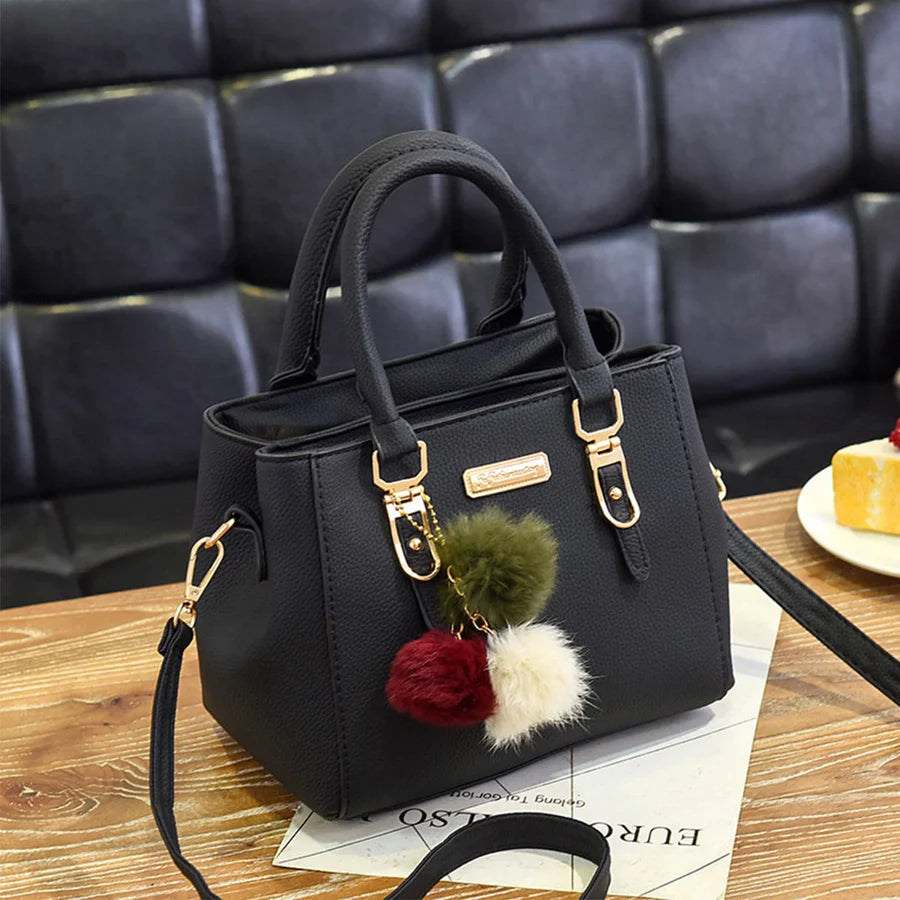 Stylish Leather Handbag with Pendant