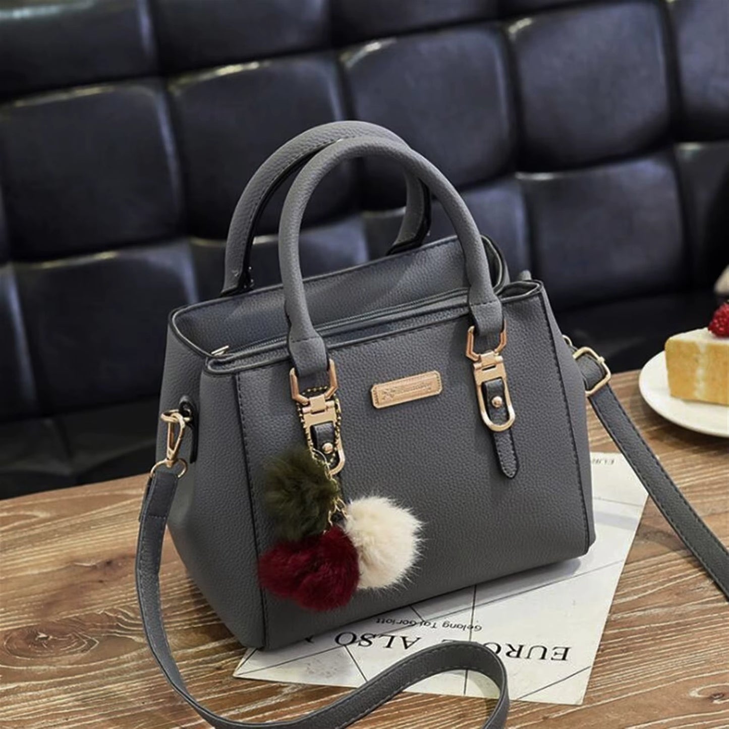 Stylish Leather Handbag with Pendant