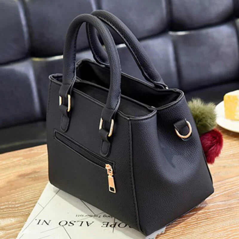 Stylish Leather Handbag with Pendant