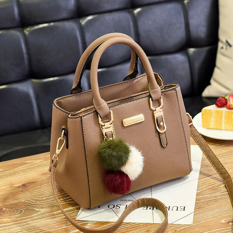 Stylish Leather Handbag with Pendant