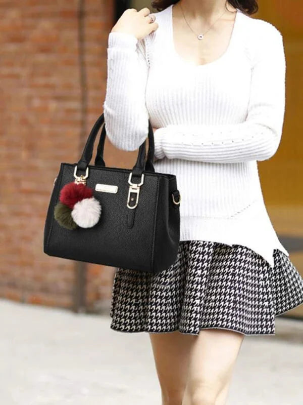 Stylish Leather Handbag with Pendant