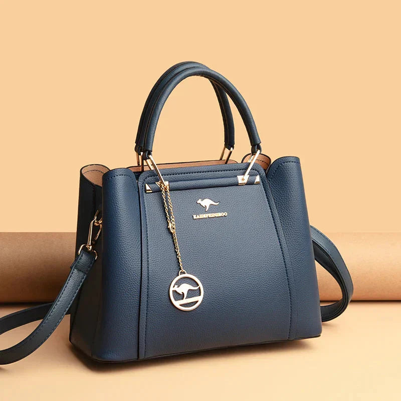 Elegant Leather Shoulder Bag by Élise