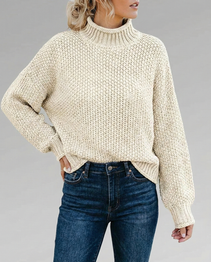 Emma – Suéter de punto grueso elegante con cuello alto y mangas abullonadas